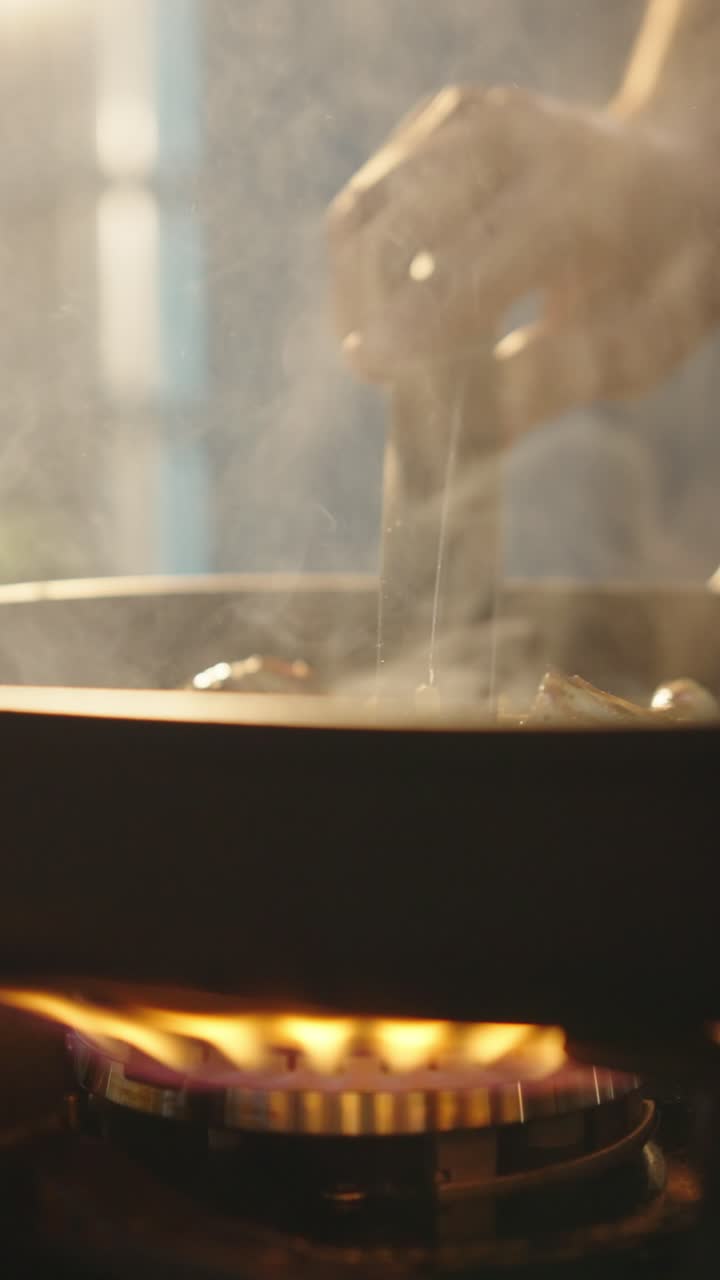 Chicken frying in a pan