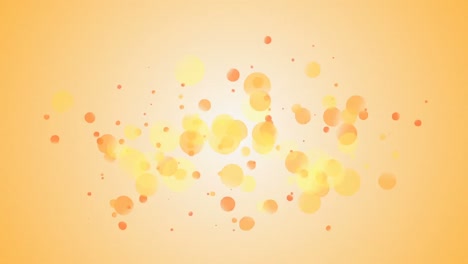 drops of yellow color exploding against the background