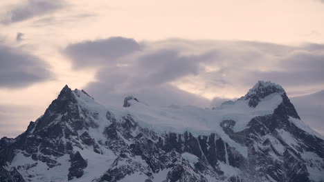 Golden-Hour-Timelapse-Of-Clouds-Rolling-Over-Cerro-Paine-Grande-In-Torres-del-Paine-National-Park