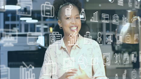 animación de iconos de negocios y procesamiento de datos sobre mujer de negocios afroamericana en la oficina