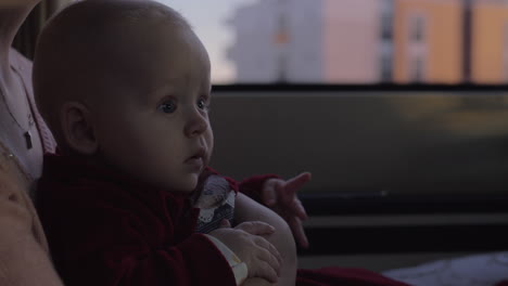mum with baby daughter on car journey