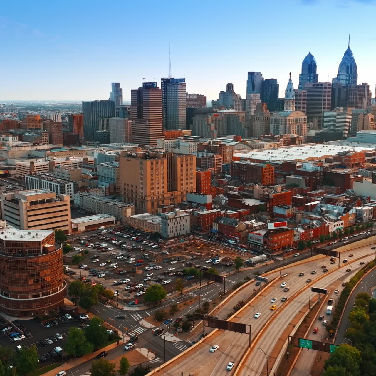 Heavy traffic in the Philadelphia downtown at daytime. City scenery from drone footage