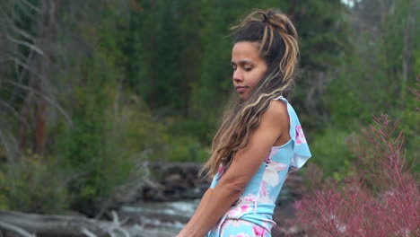 Cinematic-female-women-actress-model-close-up-standing-on-rocks-towards-still-calm-Piney-River-Ranch-Denver-Vail-Beaver-Creek-Avon-Gore-range-scenic-mountain-landscape-gold-hour-light-adventure