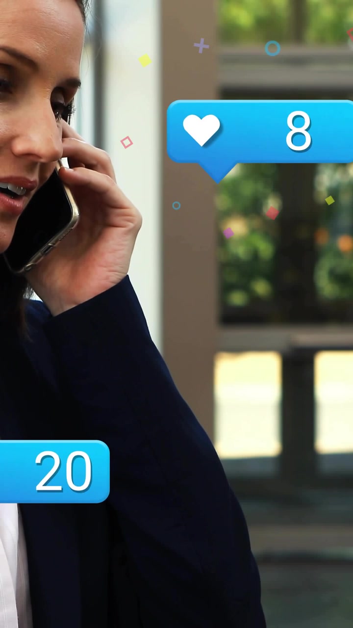 Vertical video: Marketer tapping phone in atrium causing blue bubbles rising counts, handling call