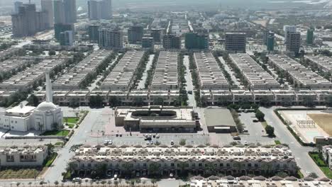 aerial view of modern houses bahria town housing estate in karachi with masjid