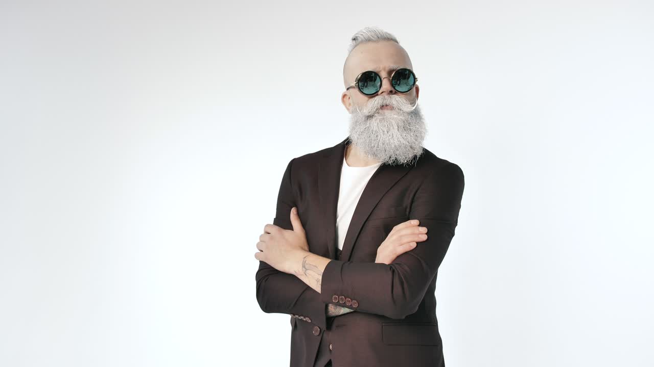 Happy stylish excited businessman having fun, dancing, rejoicing to achieve goal indoors.