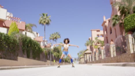 female posing riding on roller skates