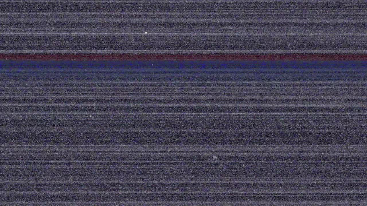 Animazione di interfaccia digitale su schermo con linee e glitch