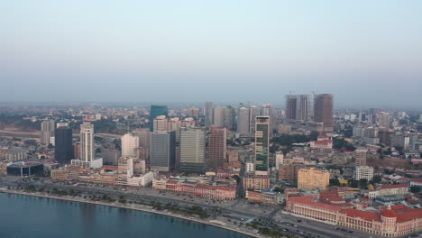 traveling back, luanda city, golden hour flying over luanda, africa