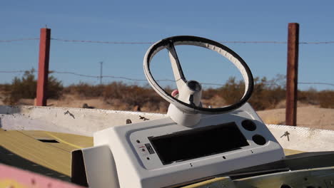 steering wheel in desert