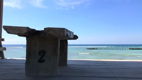 Wooden-pier-dock-with-a-tropical-sea-view-in-Gili-Trawangan,-Bali,-Lombok,-Indonesia