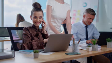 happy business woman calling on cellphone