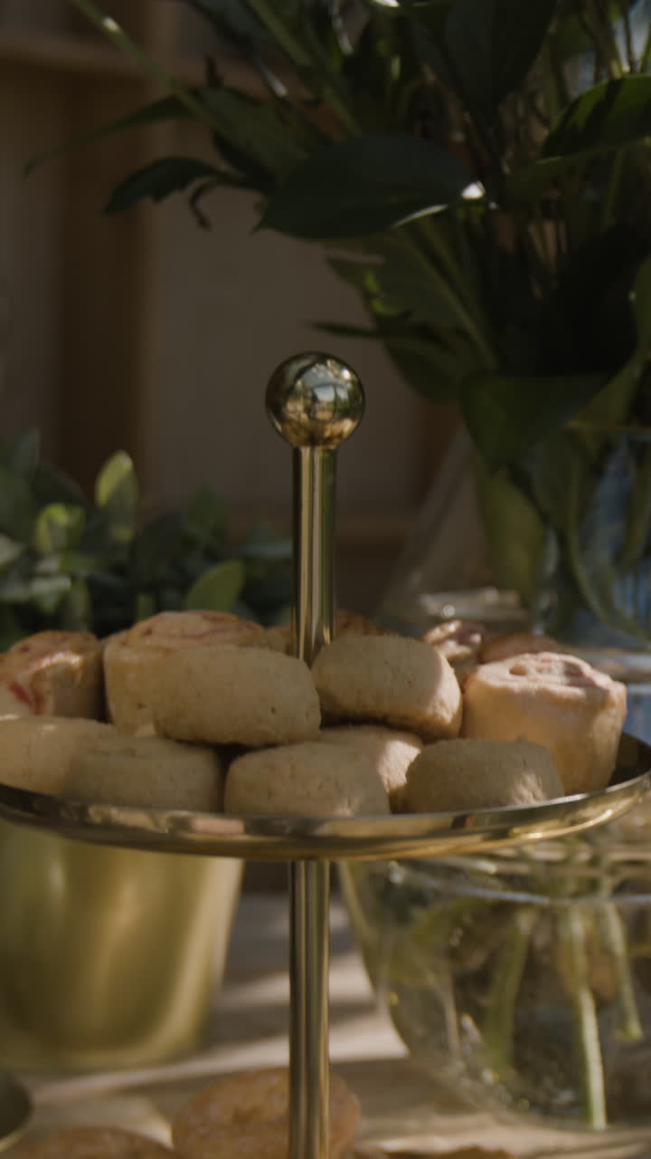 Assortment of Baked Goods on an Elegant Two-Tiered Dessert Tray