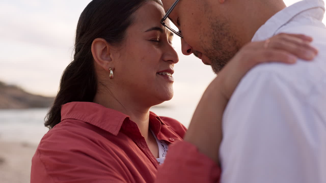 Love, hug and sunset with couple at beach