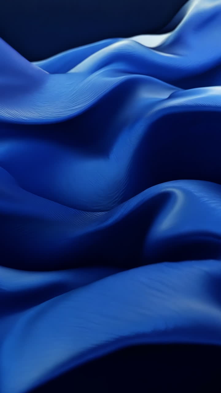 A blue and orange wave of fabric. The blue is very deep and the orange is very bright