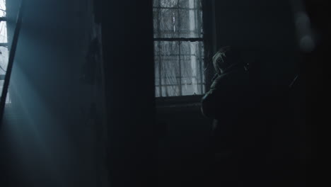 a wounded soldier in the abandoned military complex