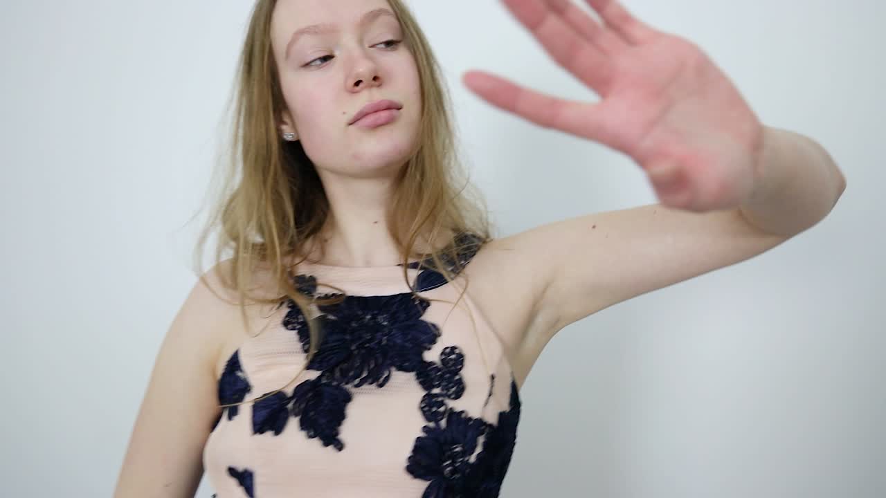 White Room Elegance Attractive Dancer's Thoughtful Dance Performance