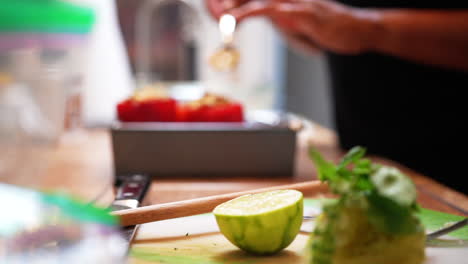 Stuffing-bell-peppers-with-organic-vegetarian-filling---slow-motion-rack-focus