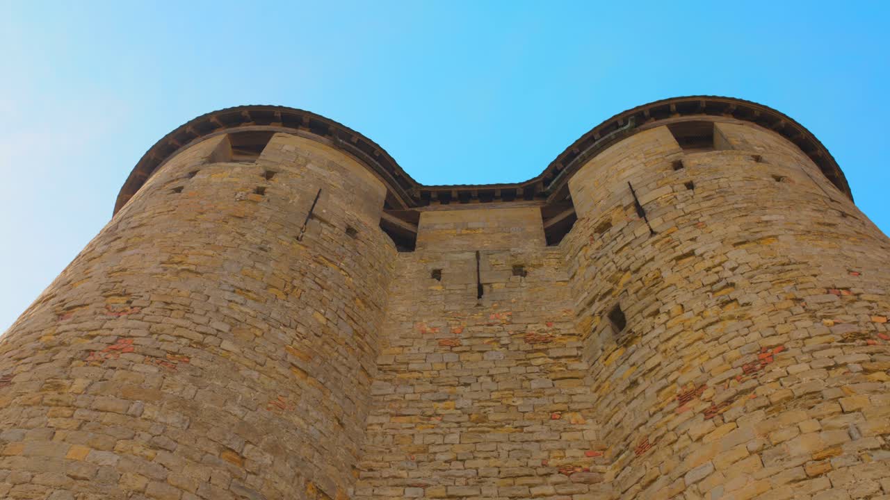 The Prominent Preserved Castle Of Cité de Carcassonne In The Fortified City Of Carcassonne In France. Low Angle Shot
