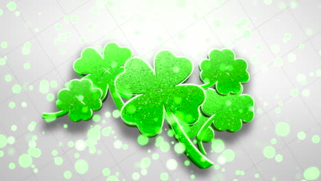 closeup shamrocks pattern with glitters on white gradient