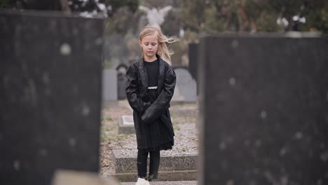 sad, death or kid in cemetery for funeral