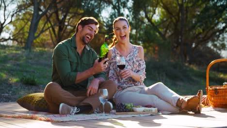 Smiling-couple-having-glass-of-wine-4k