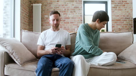 couple hanging out on the sofa