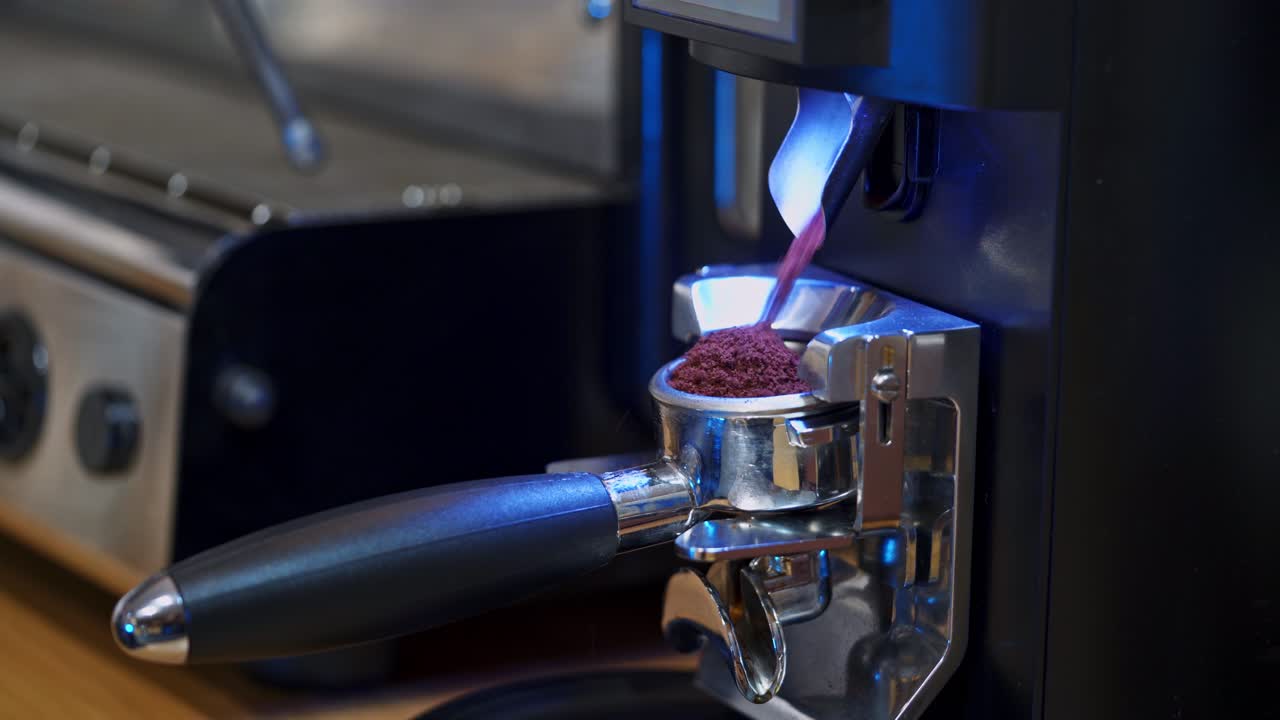 Barista working with coffee machine. Barista making coffee with espresso machine in cafe