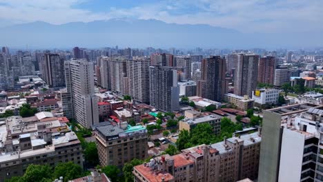 aerial view of dense residential high‑rise skyline in santiago, chile, with the andes mountains on the horizon