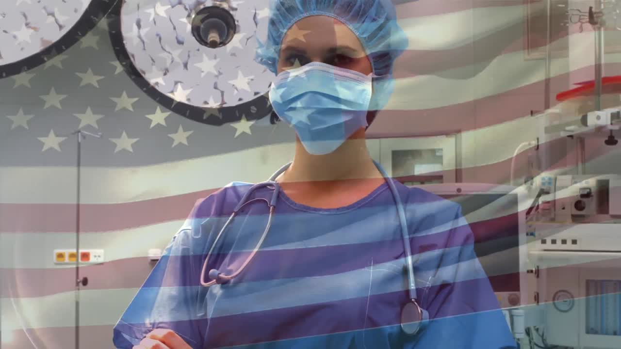 animación de la bandera de los estados unidos ondeando sobre los cirujanos con máscaras faciales