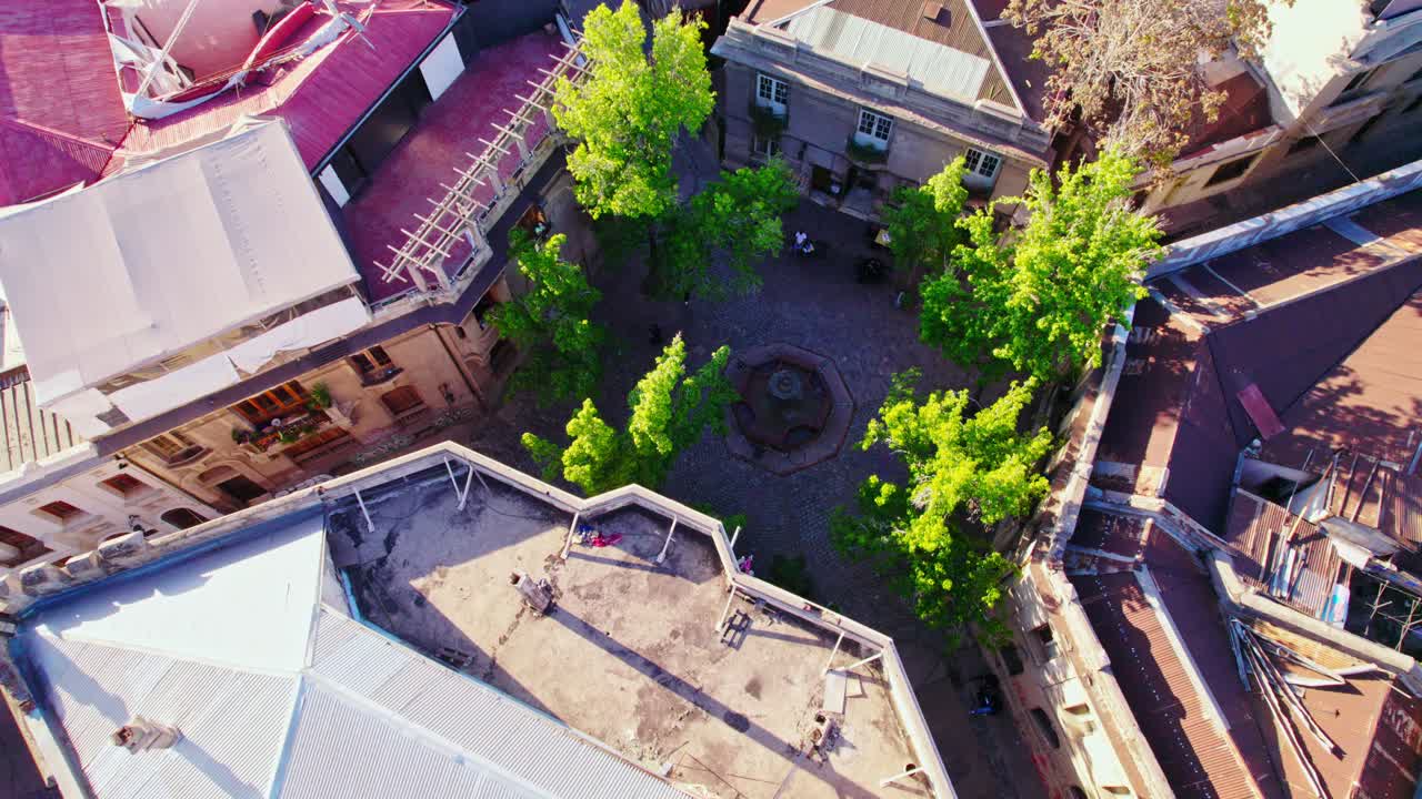 Aerial Drone Fly Above Cobblestone Square Landmark in Concha y Toro Santiago de Chile Medieval Neighborhood