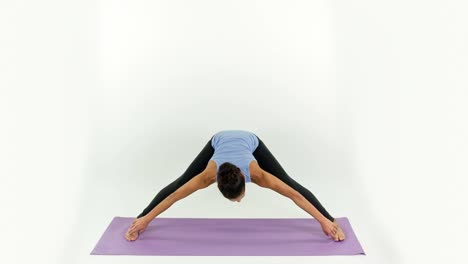 woman doing yoga studio 38