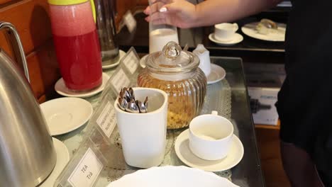 sequential pouring of milk into a teacup