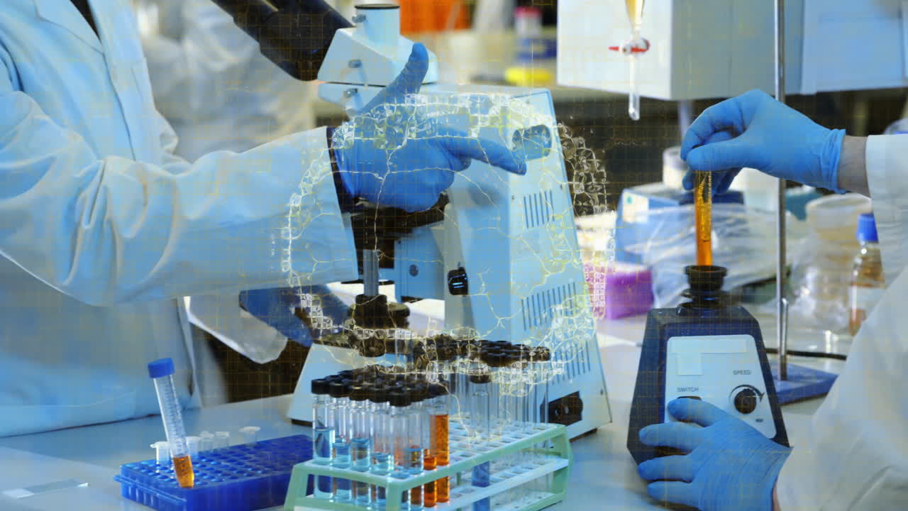 In lab, scientists analyzing test tubes and microscope with animation data overlay