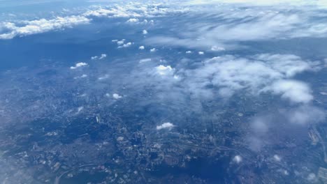 Beautiful-aerial-view-seen-through-window-of-flying-airplane