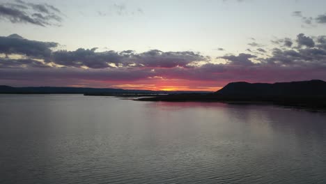 sunset over a river and marsh landscape