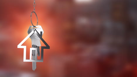 house-shaped keychain animation over blurred red background