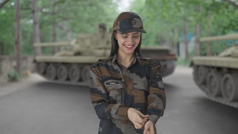 happy indian army officer wearing hat