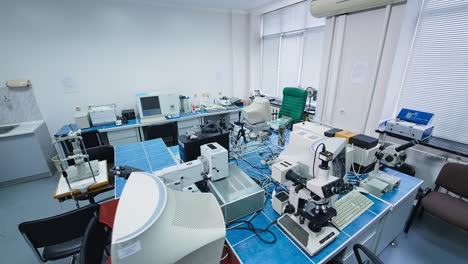 medical laboratory for analysis in modern hospital. well-equipped room for tests and researches. microscopes, computers and other apparatuses in laboratory.