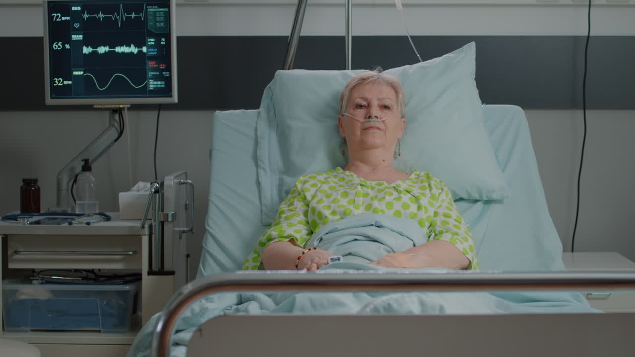 Portrait of patient waiting to receive medical support in hospital ward