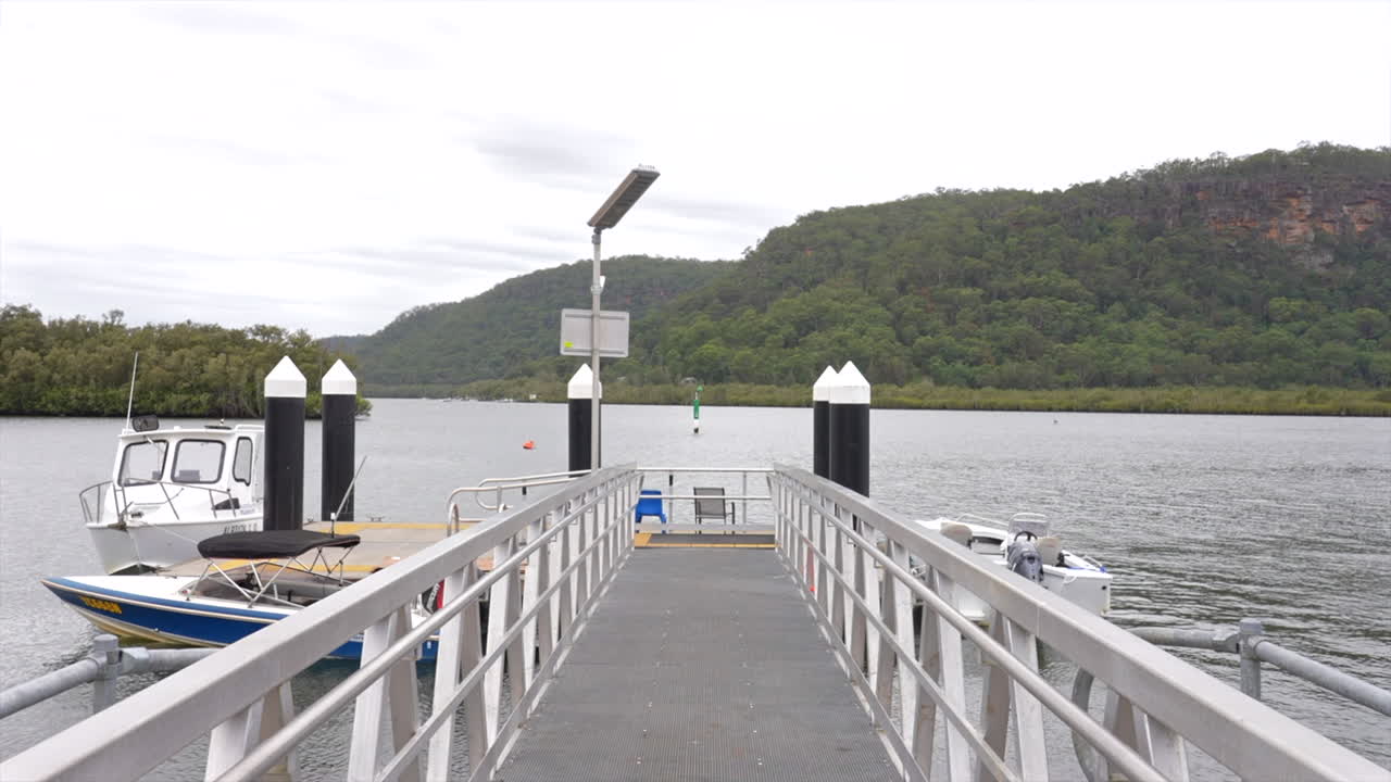 Boat jetty on the Hawkesbury river in the small town of Spencer, Australia