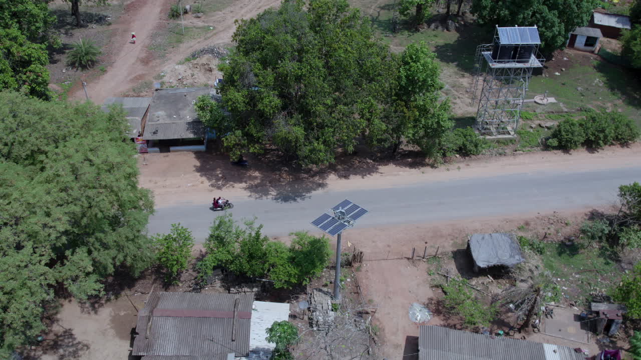 Aerial shot of solar high mast light in village