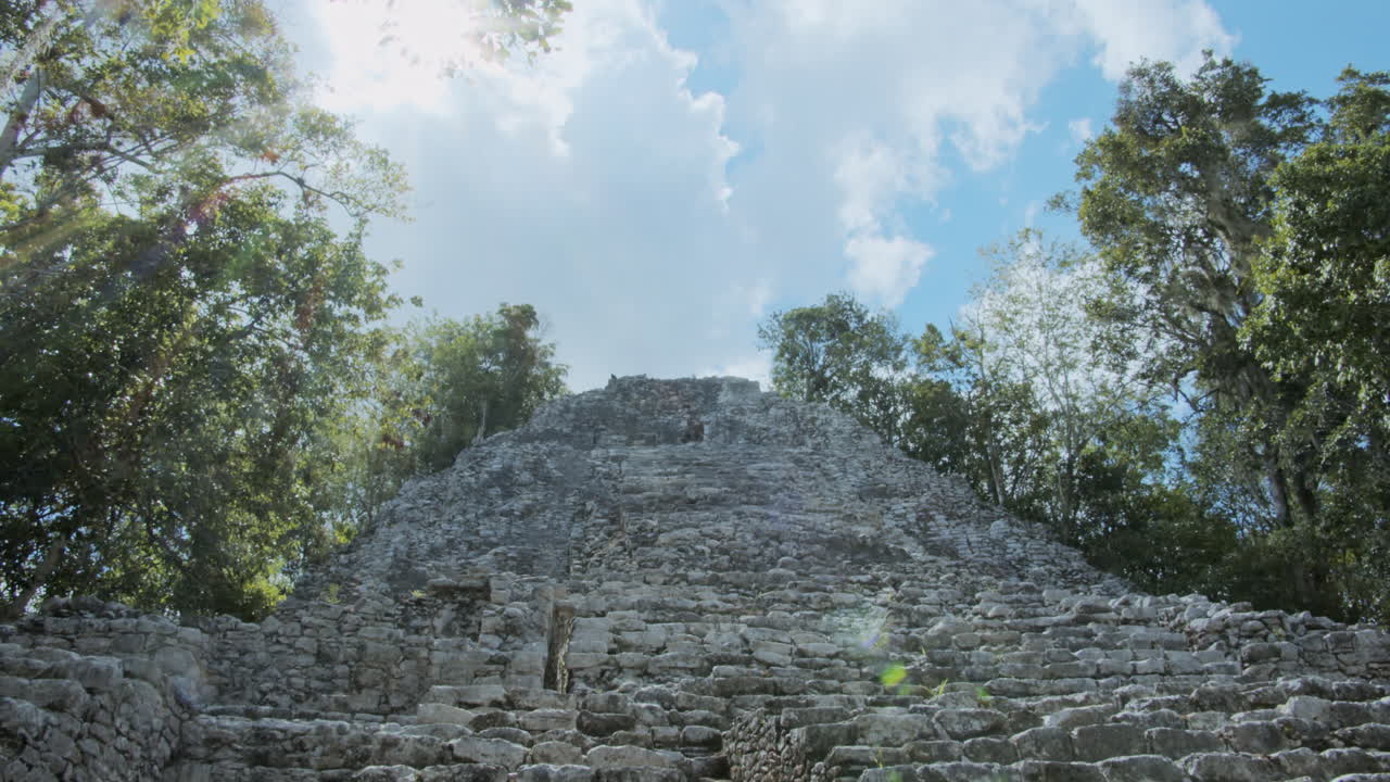 Pan shot of mayan pyramid at Muyil archeological site, Chunyaxche, Quintana Roo, Mexico