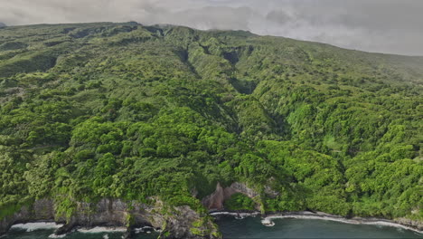 maui hawaii aerial v1 island landscape view, flyover pailoa point on eastern coastline capturing wailua falls and hāna forest reserve with lush vegetations - shot with mavic 3 cine - december 2022