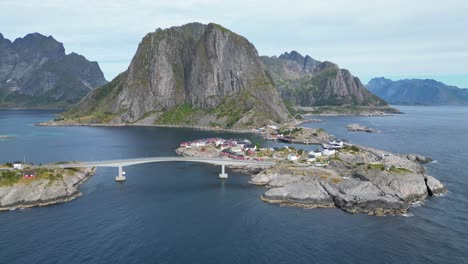 hamnoy village, fjords and scenic road in lofoten islands, norway - aerial 4k circling