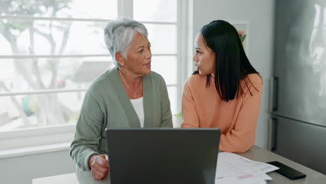 Laptop,-finance-documents-and-a-daughter-talking