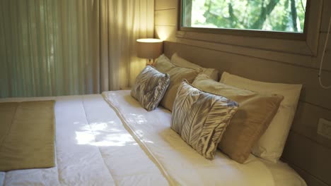 cozy treehouse bedroom with jungle view