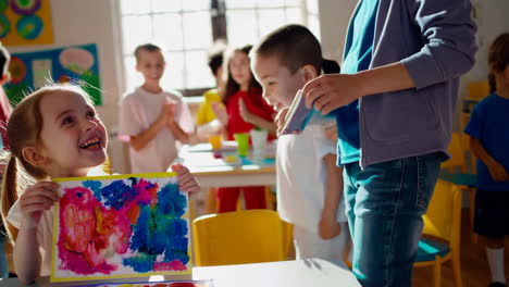 children engaged in a vibrant art class