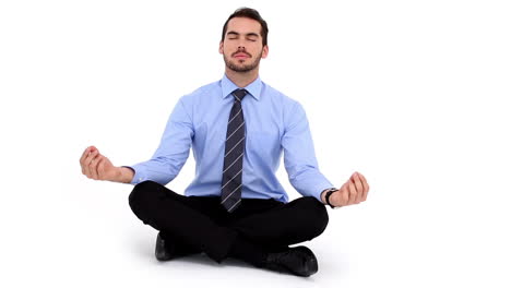 Businessman-sitting-in-lotus-pose