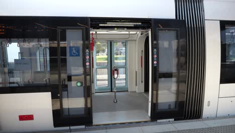 train doors closing and opening, empty tram